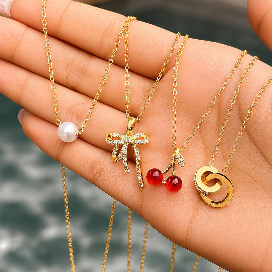 "BOW" PVD GOLD-PLATED BRASS NECKLACE-CRYSTALLIC"