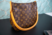 Looping Monogram Hand Bag